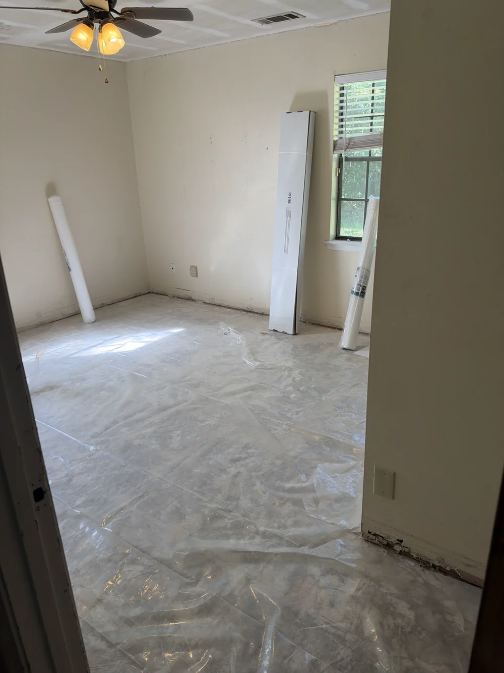 Bedroom with bare floor ready for the next work stage