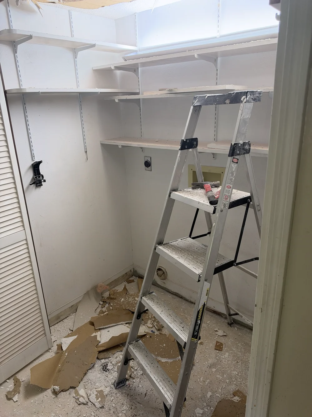 Interior wall and shelving area during renovation